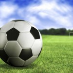 100373_2topics_com_soccer-ball-on-the-grass